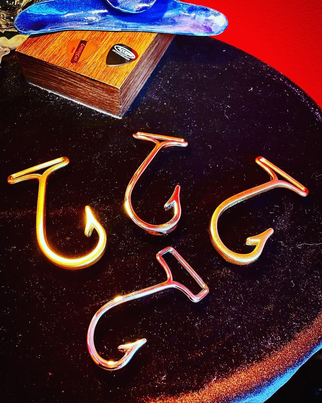 Fish hook buckles